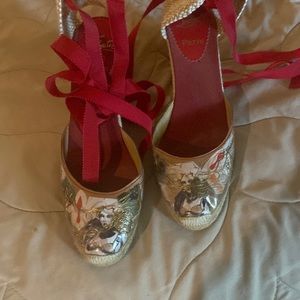 Lace up espadrilles by Christian Louis Vuitton